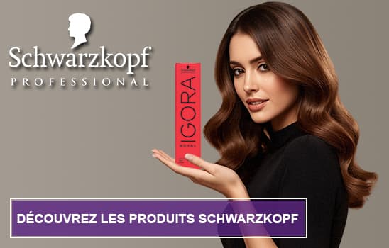 Une femme qui a un tube de Igora Royal dans sa main